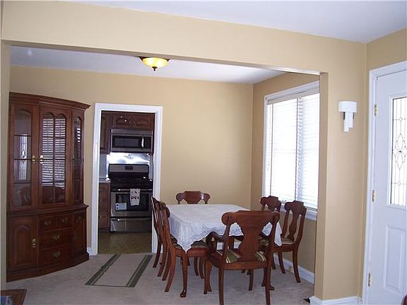 The dining room adjoins the living room.