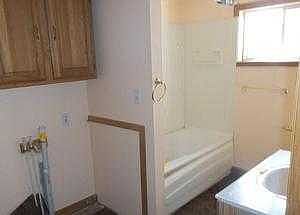 Bathroom with laundry hookups downstairs