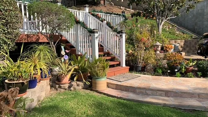 Stairs to patio from private driveway