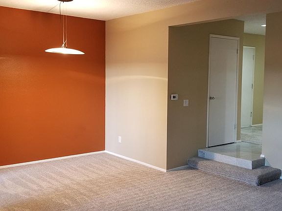 Dining and Living Area with New Carpet