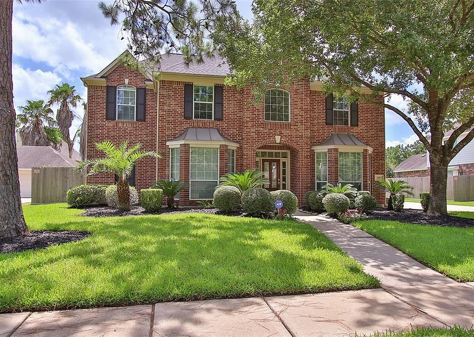 Stunning Home On A Oversized Lot With Lead Glass Door Inviting To Come In.