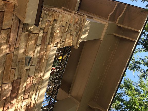 Looking up at balcony/patio