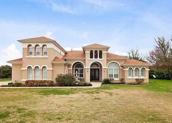 Quality and attention to detail abound in this spectacular Mediterranean-style home!