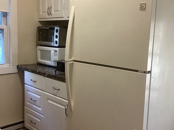 Kitchen with fill size frig