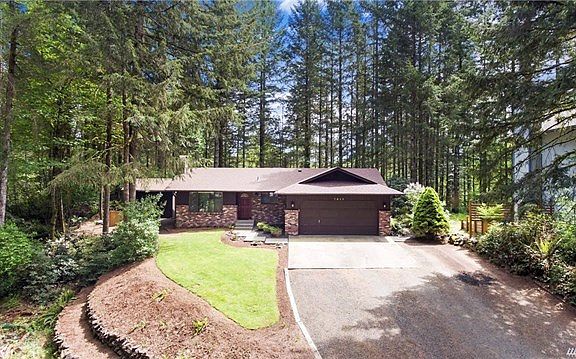 Double lot...Includes the lot to the left in this photo.  A true Northwest setting with beautiful Fir trees and mature shrubs.