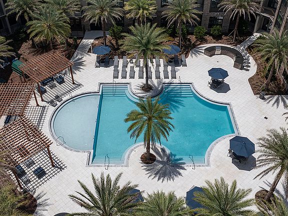Experience a touch of paradise with this elegant resort-style pool, perfect for relaxation.