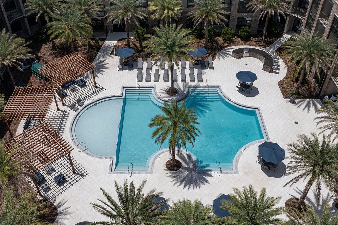 Experience a touch of paradise with this elegant resort-style pool, perfect for relaxation.