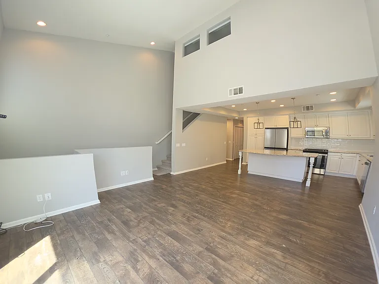 Open concept living space with plentiful, year-round light.
