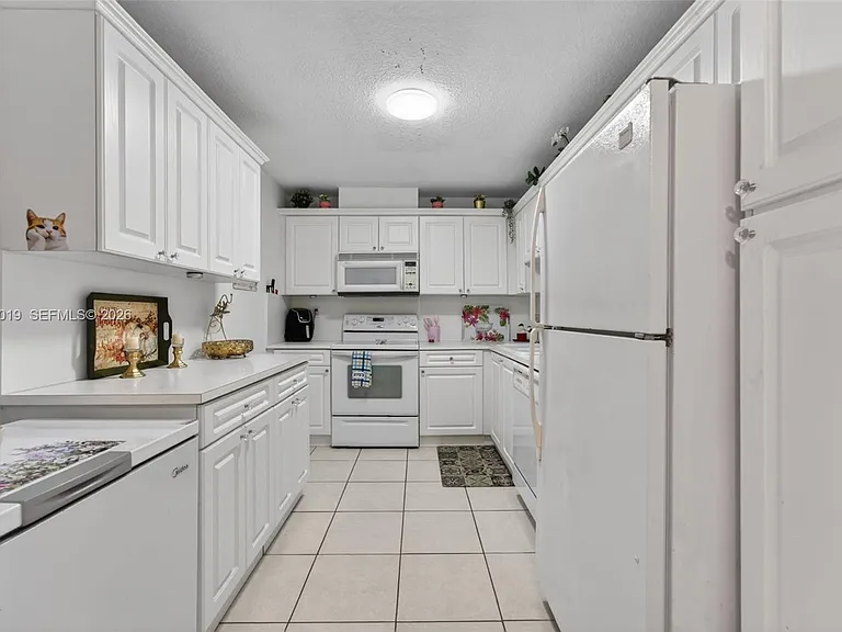 10777 W Sample Rd #209 — Photo 4