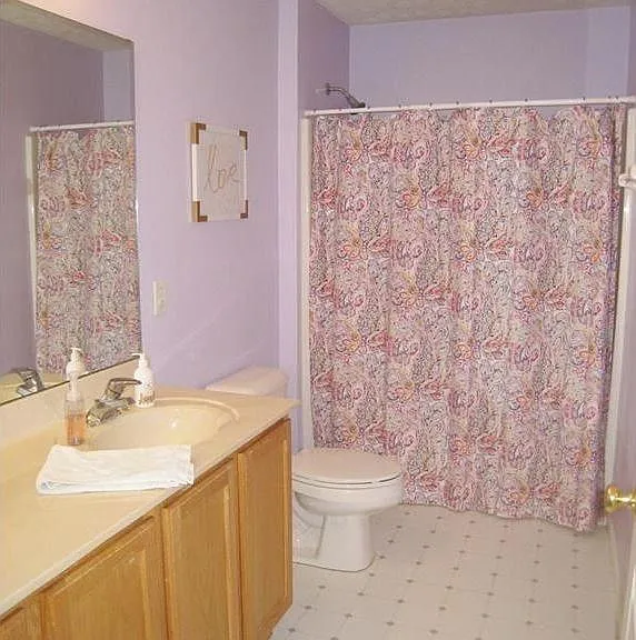 This 4 piece bathroom is shared by the 3 smaller bedrooms upstairs.