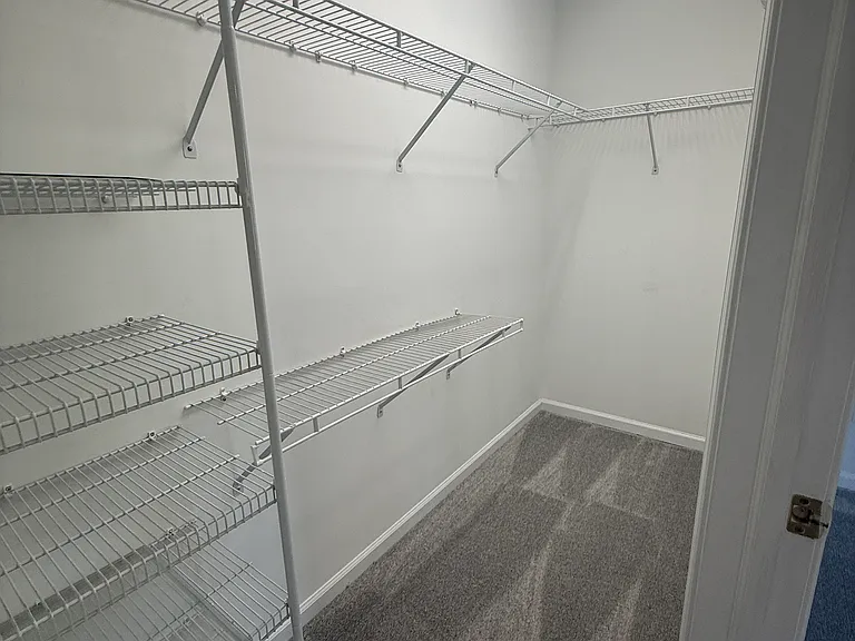Master bedroom walk in closet 1