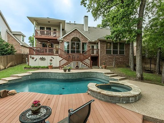 Pool, spa, decks, mature trees.