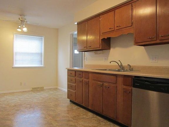 Kitchen is open to the dining room with plenty of light.