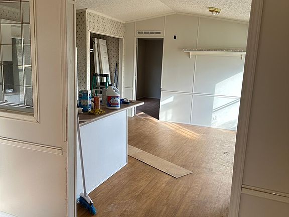 Living room looking to kitchen dinning area