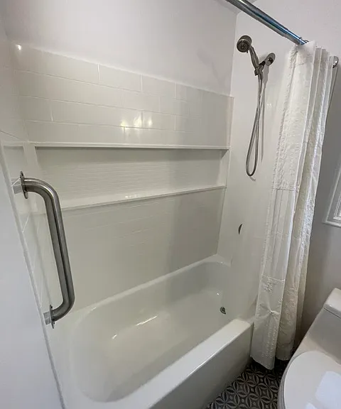 New tub & Shower w/ grab bars