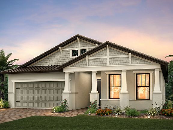 The Summerwood, a single-story family home with a 2 car garage, shown with Home Exterior C2E