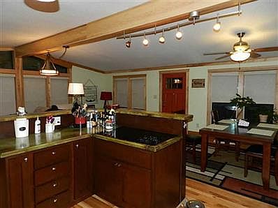 Kitchen. Cooking here lets you still be in the mix with guests!