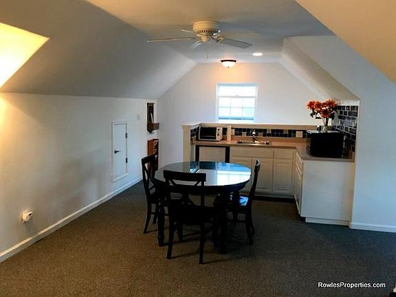 Dining table & chairs, and kitchenette. Toaster oven & microwave oven provided.