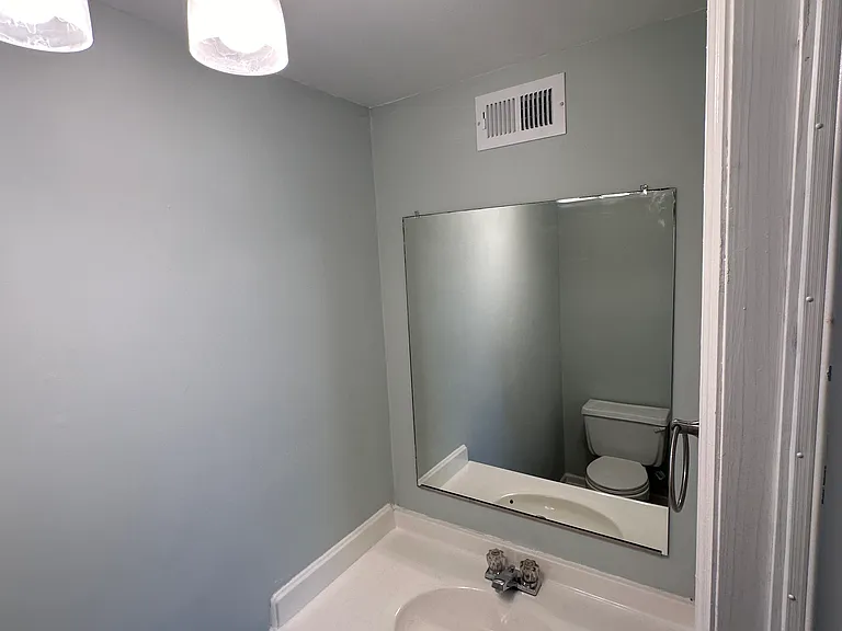 1/2 bath next to laundry hook-up