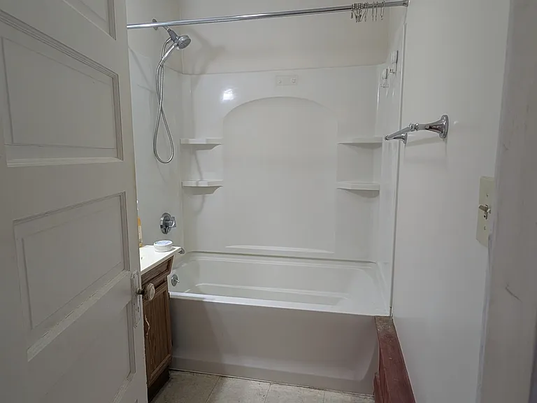 Bathroom (toilet behind door)