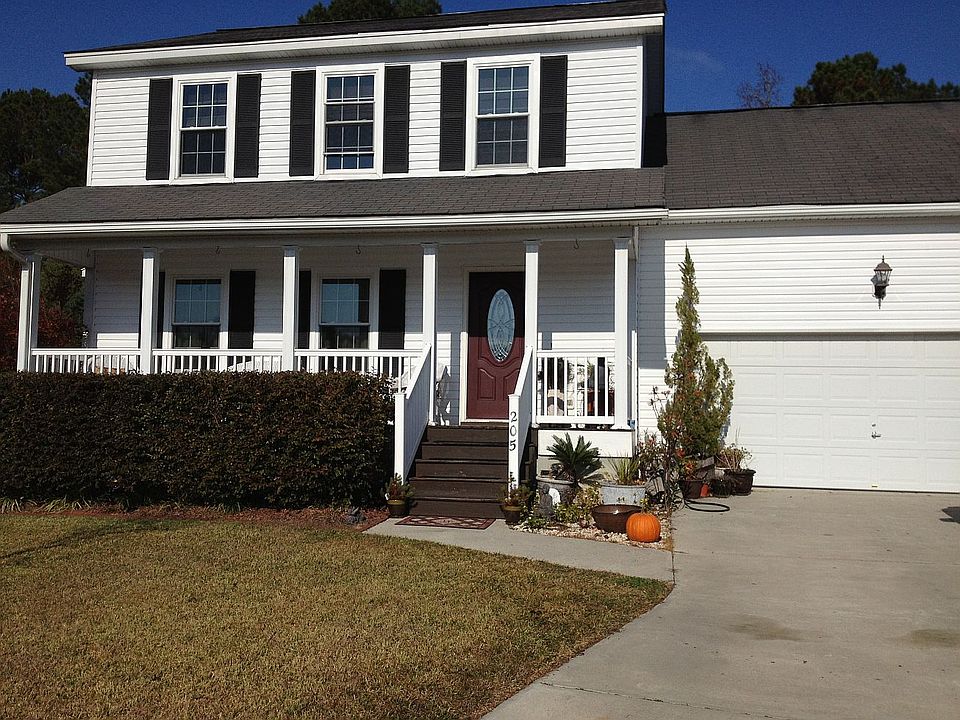 Two-Story Vinyl Siding with Attached Two-Car Garaqge