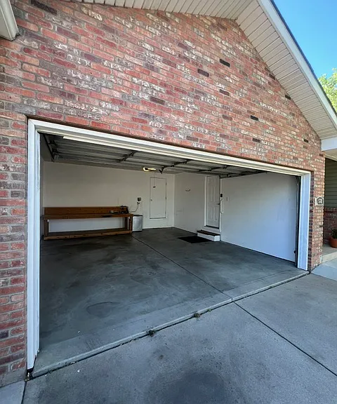 2-car (deep) garage, 20 ft x 19 ft - workbench included