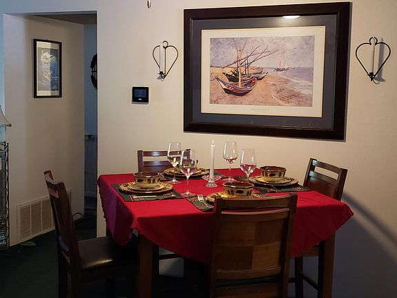 Dinning nook, carpet shown here has been replaced with a grey tone throughout the condo.