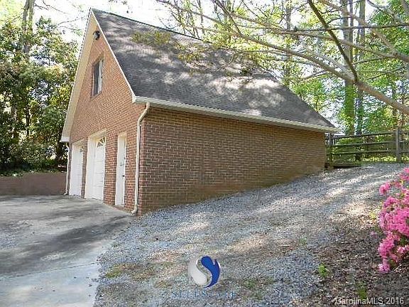 Full brick 2 car garage with bonus area.