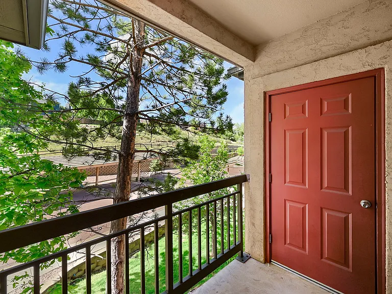 2nd balcony: private to primary bedroom suite. Red door is a storage closet.
