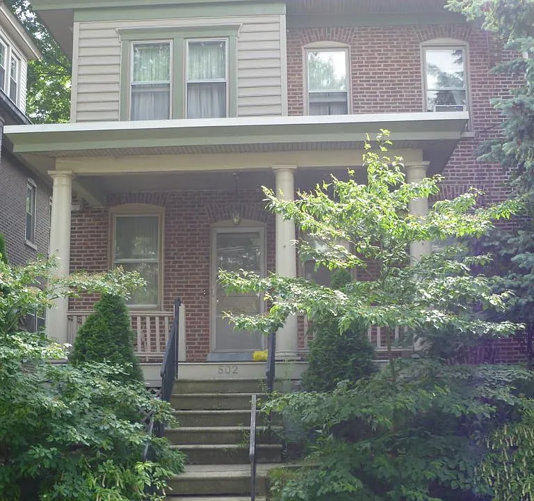 Exterior and front porch. Landscaped with native plants
