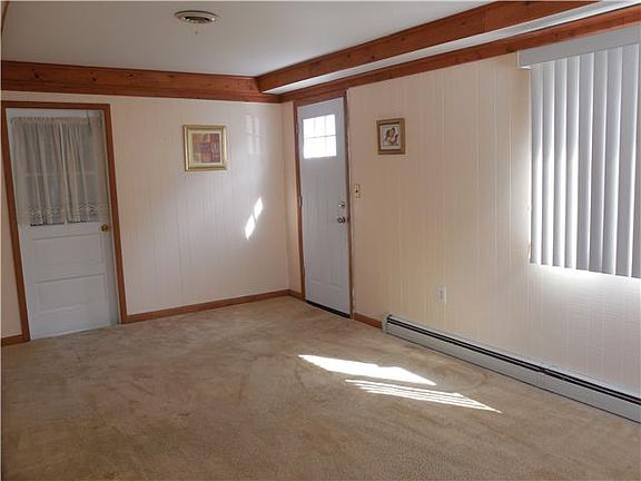 Spacious family room is near kitchen & laundry