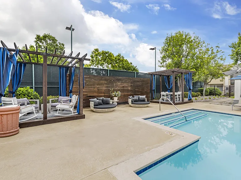 The Summit's pool deck is the ultimate retreat, featuring private cabanas, individual sunloungers, and a soothing spaperfect for relaxing in style under the Chino Hills sun.