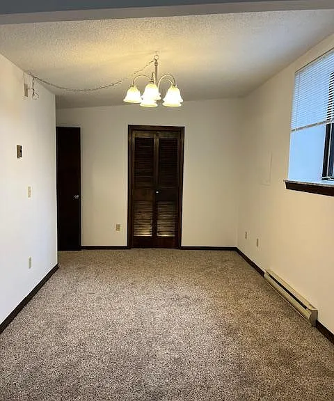Formal dining room, with storage closet.