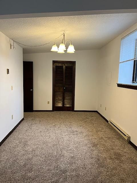 Formal dining room, with storage closet.