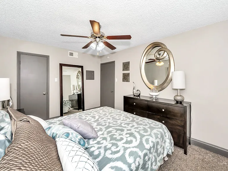 Comfortable bedrooms with ceiling fans and ample space to unwind.