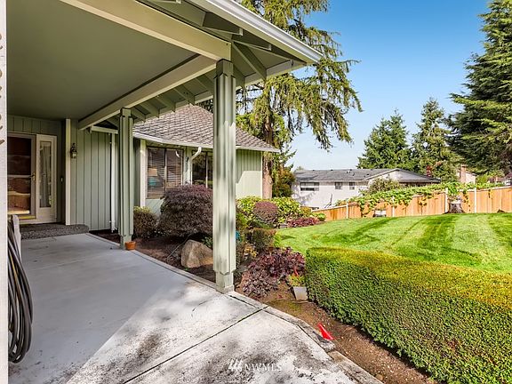 Front porch and splendid front yard.