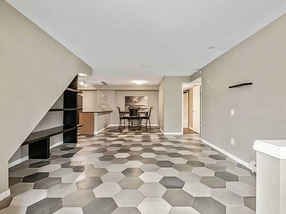4th image of 21 E McKenzie Towne Gate SE #2