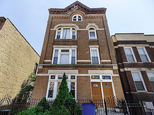 Beautiful vintage Chicago brick building with classic architectural details and strong curb appeal. This quiet six-unit building features secure gated entry and sits on a charming residential block in the heart of Ukrainian Village.