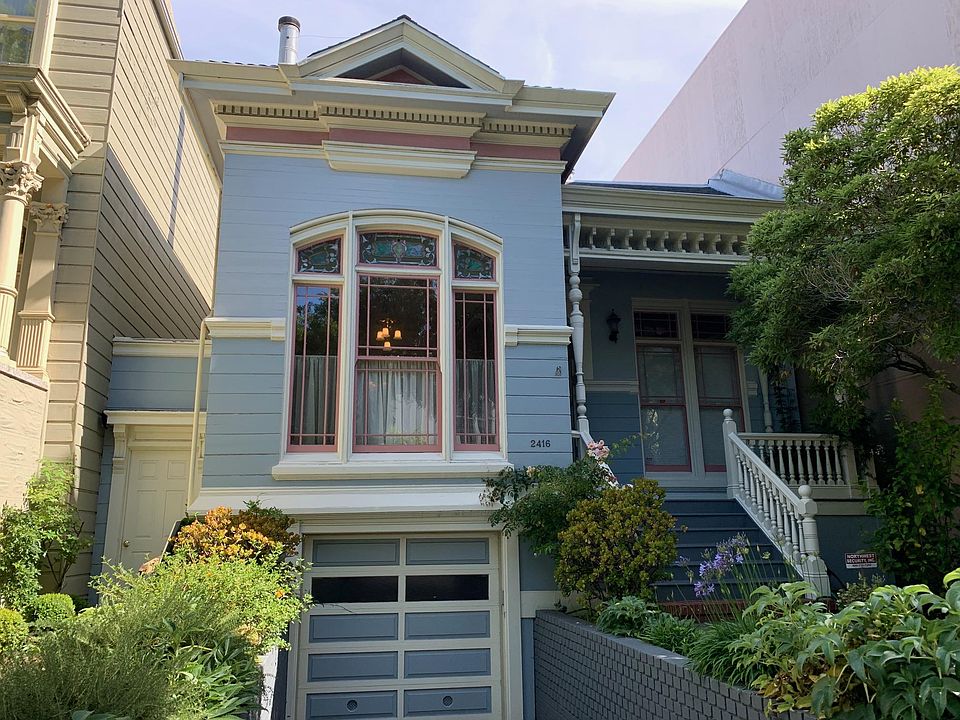 1884 Eastlake Victorian facade restored in 1989. It looks like a one-story cottage, but it is a 5-bedroom house on two levels.