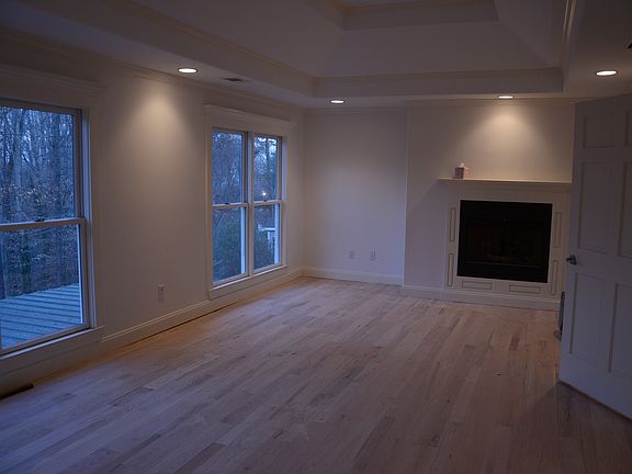 Master bedroom with fireplace, large bathroom attached with