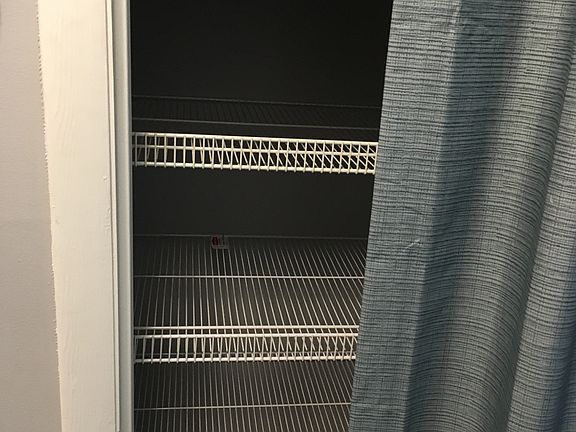 Wire shelving in linen