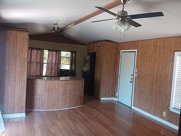 Open living area that opens onto private deck.