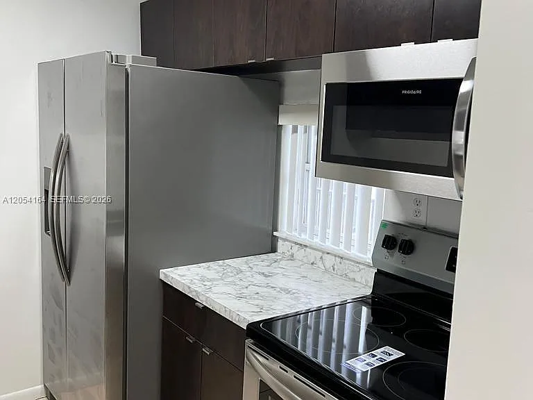 8720 N Sherman Cir #303 — Photo 4