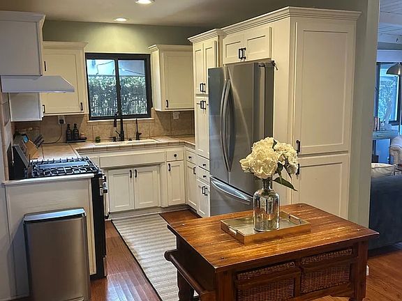 5th image of 9490 Avenal Ave #1