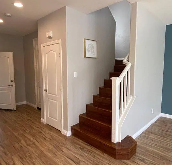 staircase and storage closet