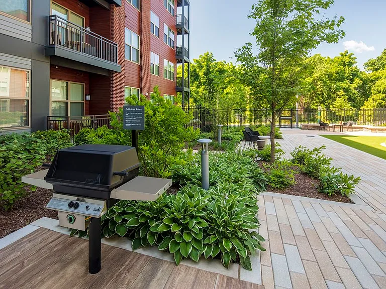 Courtyard with grill stations and dining tables
