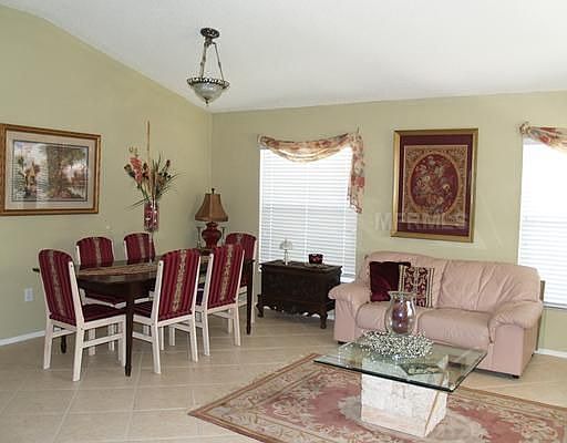 FORMAL DINING ROOM OFF FORMAL LIVING ROOM