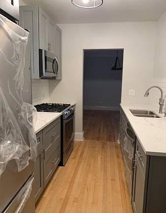 5th image of 5548 N Mulligan Ave #1