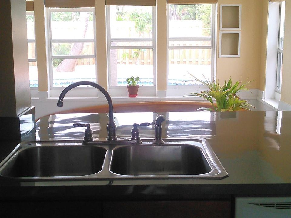Kitchen overlooks the pool