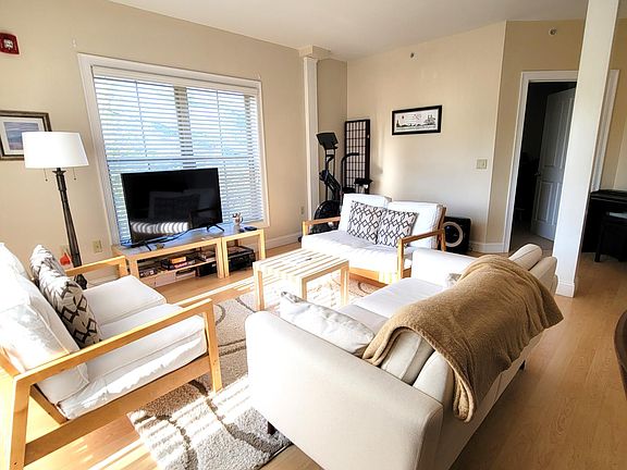 Living room with slider to balcony